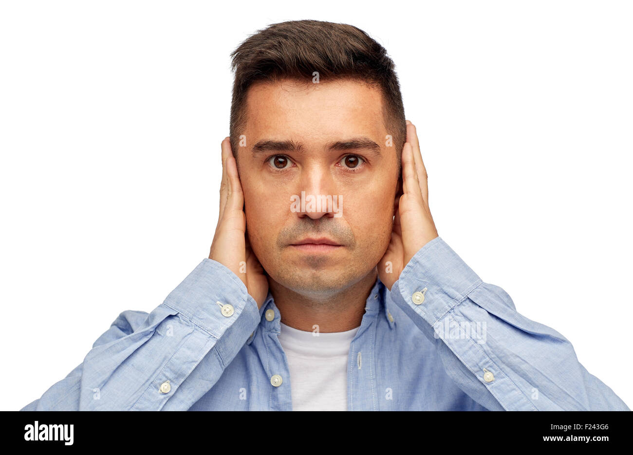 face of man covering his ears with hands Stock Photo Alamy