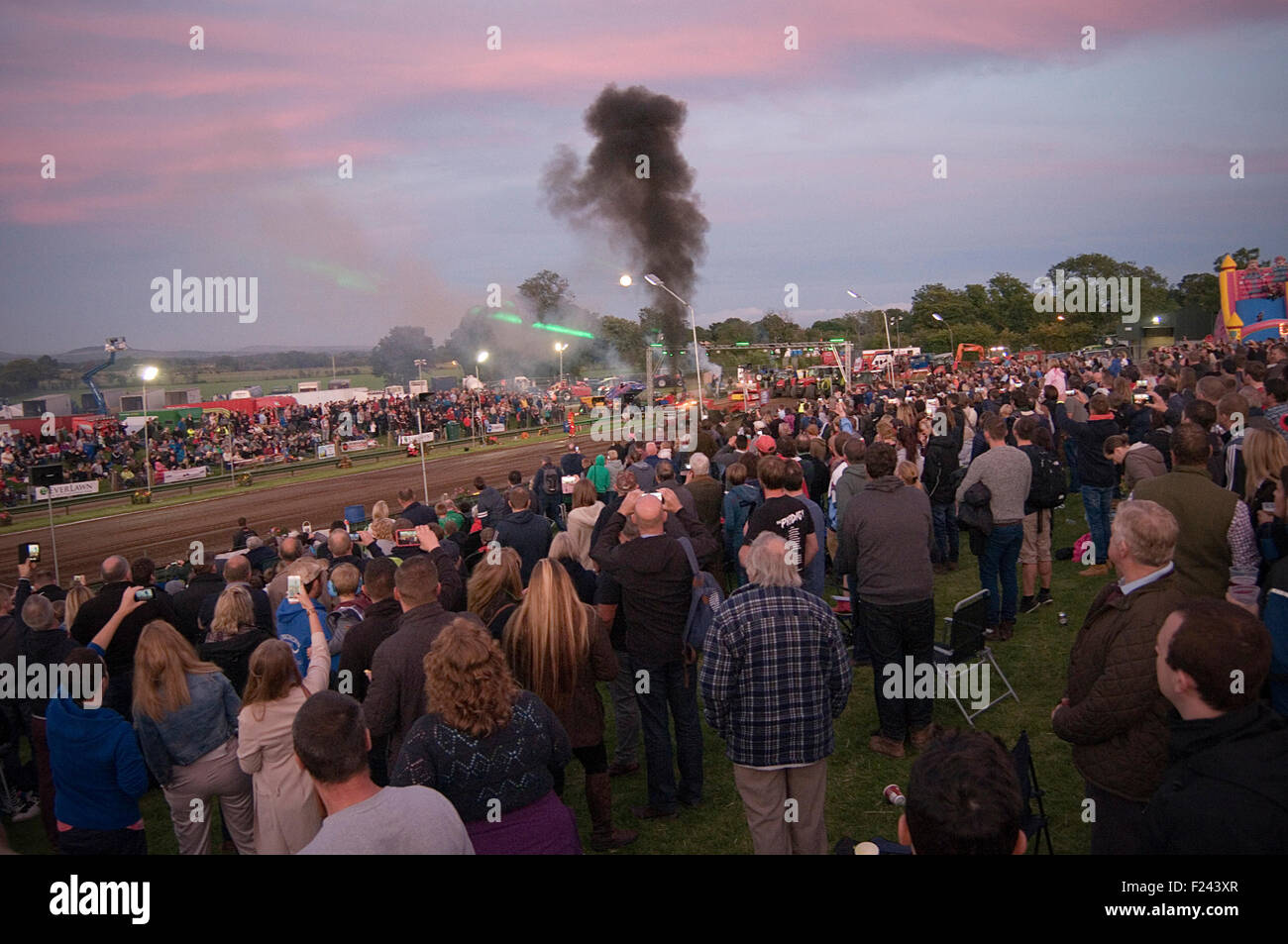 crowd at tractor pull pulling event motorsport public liability motor race racing spectators people crowds Stock Photo