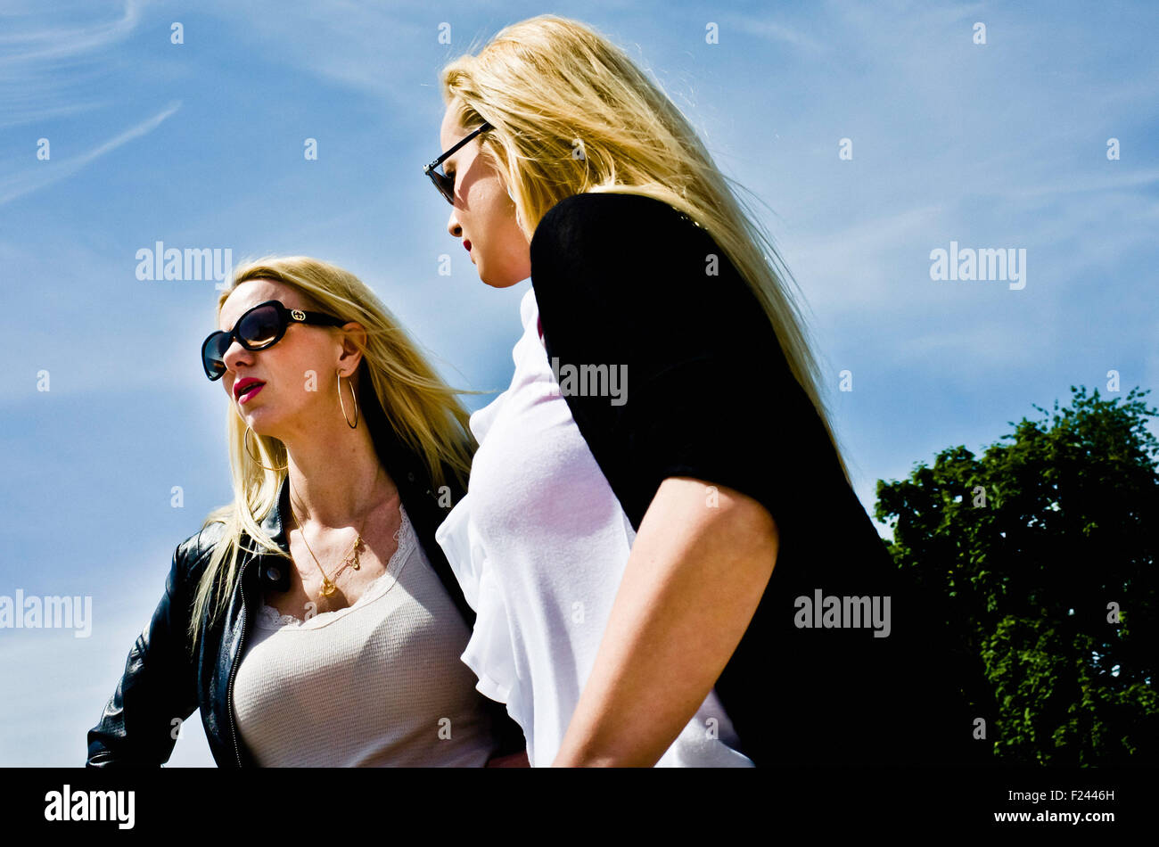 two blond women with sunglasses Stock Photo