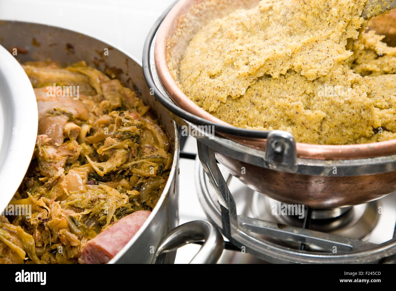 Cassoeula and polenta, a typical northern Italian dish from Lombardy, Italy Stock Photo