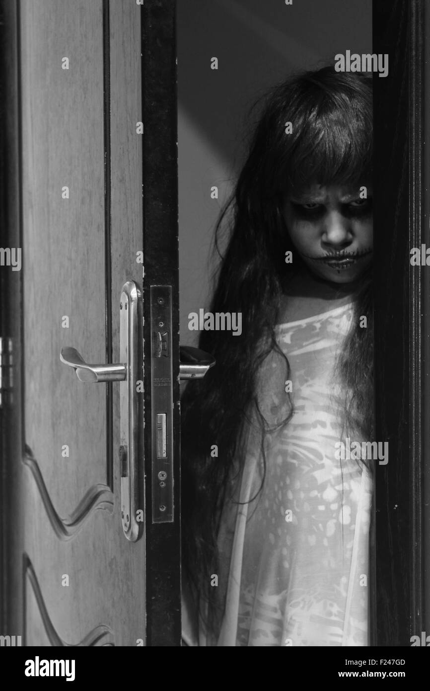 spooky little girl Stock Photo - Alamy