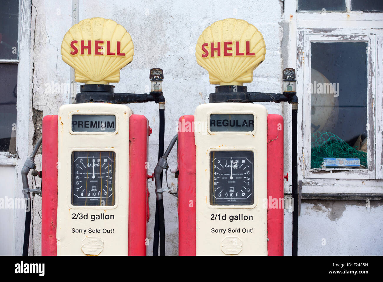 Old petrol pumps in St Mawes, Cornwall, UK. Stock Photo