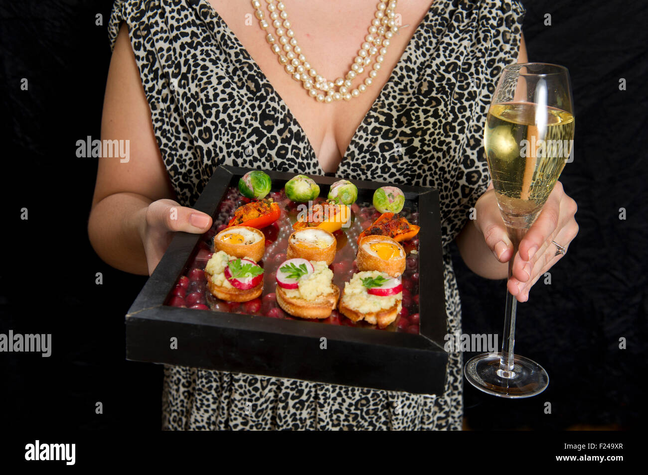 Canapes, small finger food suitable for parties. Stock Photo