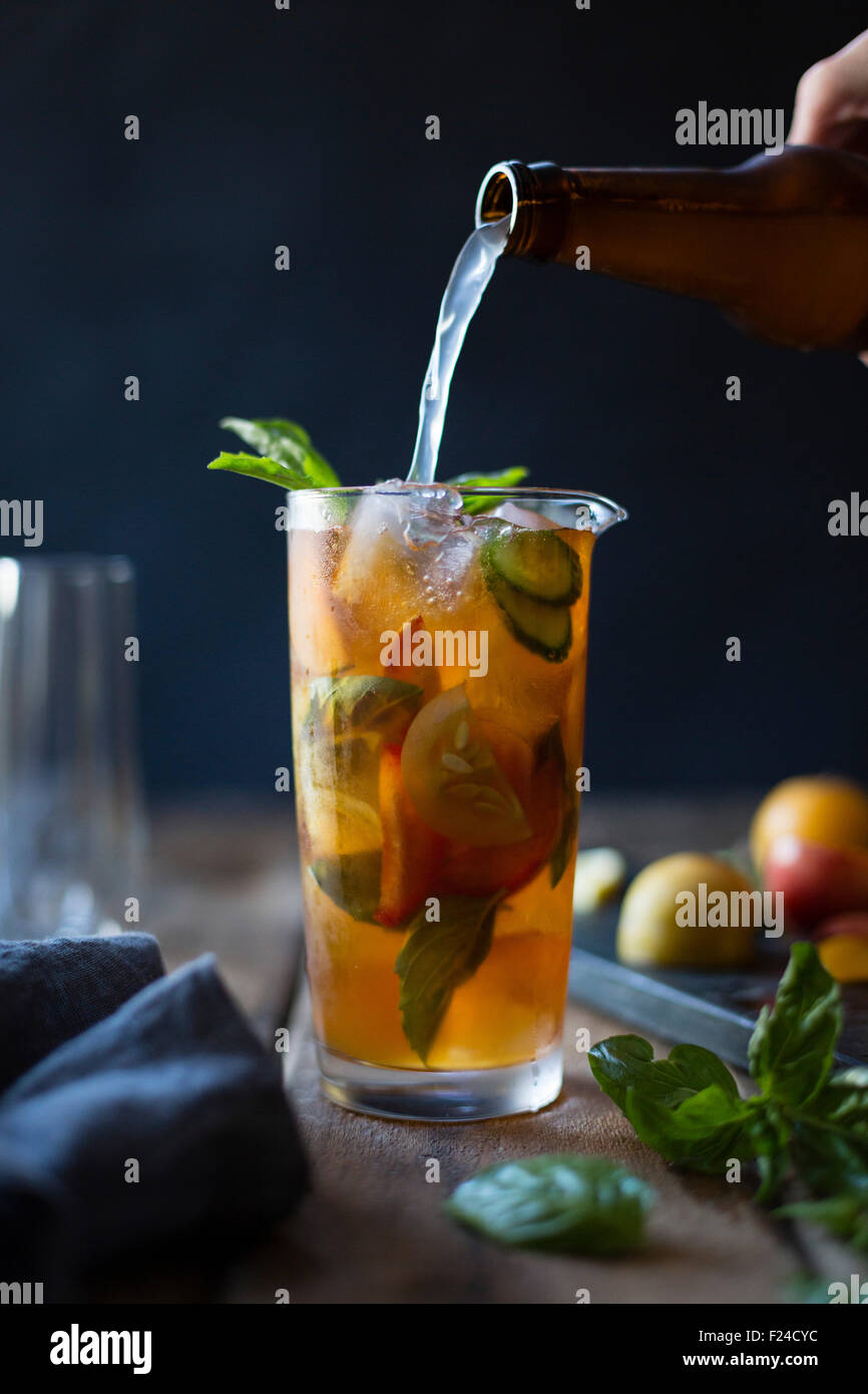 A basil plum fruit cocktail Stock Photo Alamy