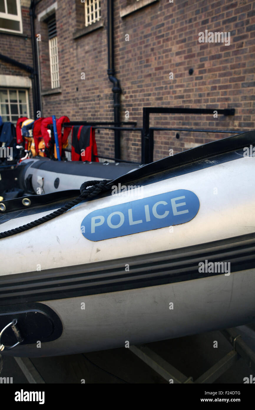 Inflatable boat at Wapping Police station on the bank of the River ...