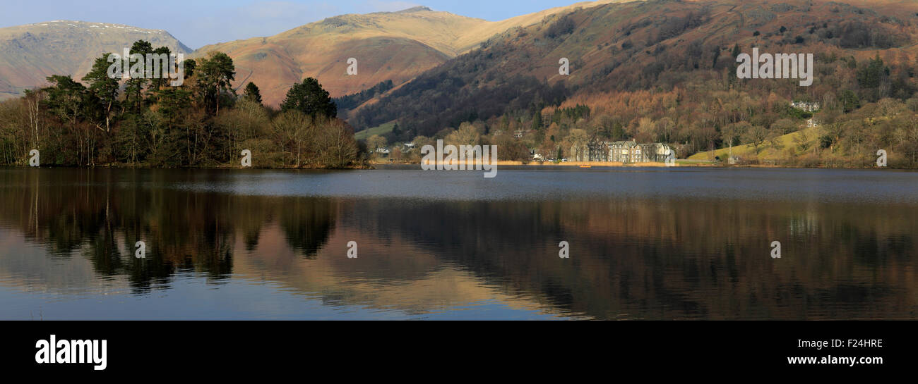 Summer, Heron Pike Fell reflected in Grasmere, Lake District National Park, Cumbria, England, UK Stock Photo