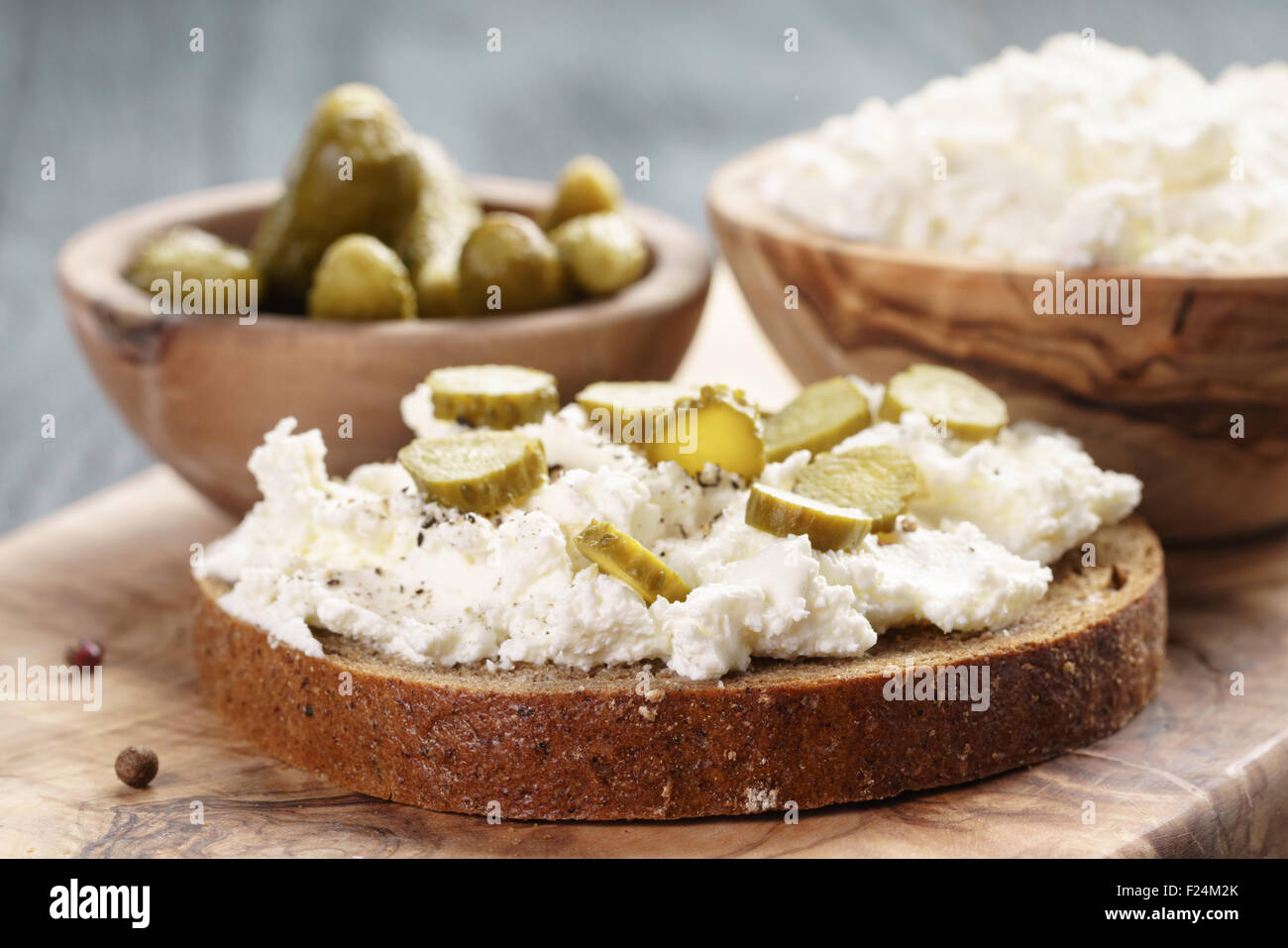sandwich with rye bread, cream cheese and marinated cucumbers Stock