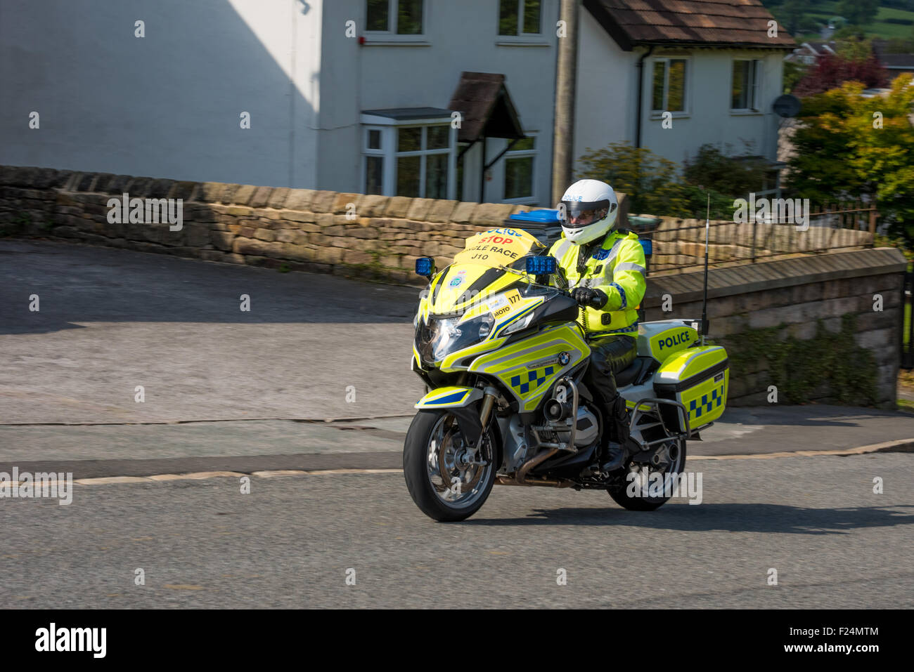 A Police Motorcyclist on a BMW R 1200 RT on Stage 6of the Tour of Britain  2015 Matlock Derbyshire UK Stock Photo - Alamy
