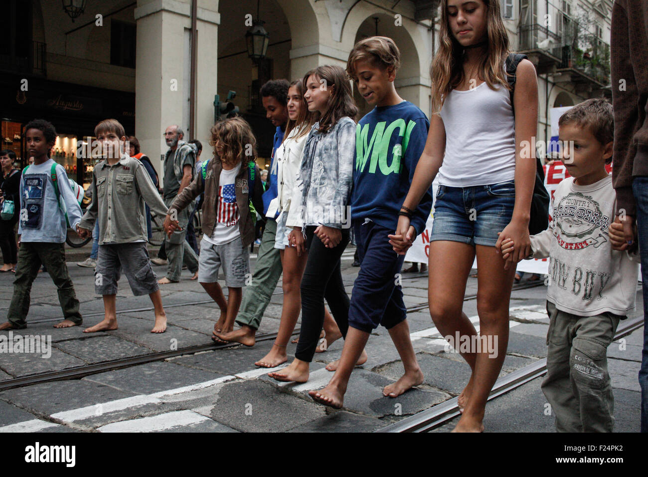 Turin, Italy. 11th Sep, 2015. A barefoot march conducted in Turin to ...