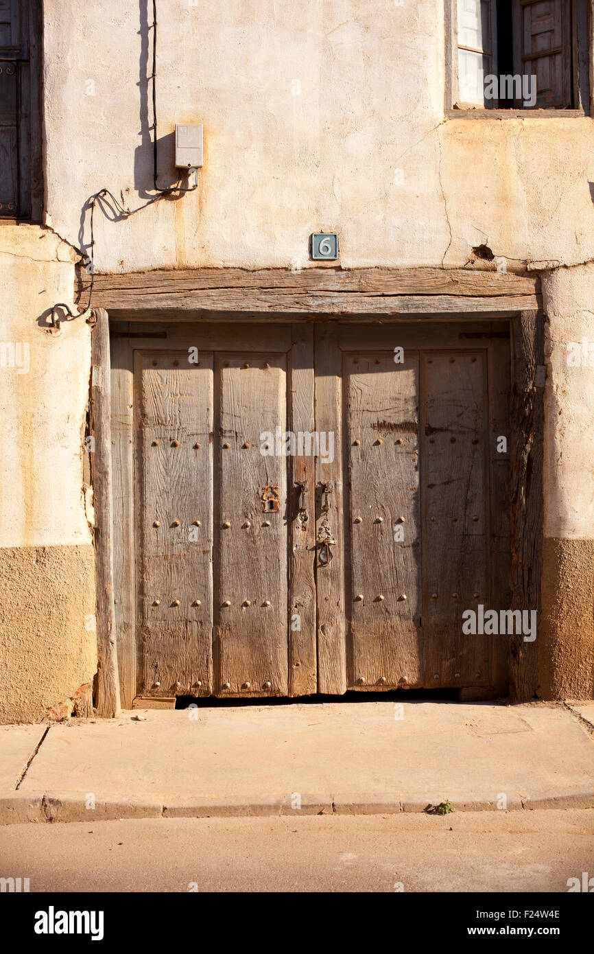 Old door of a poor house Stock Photo Alamy