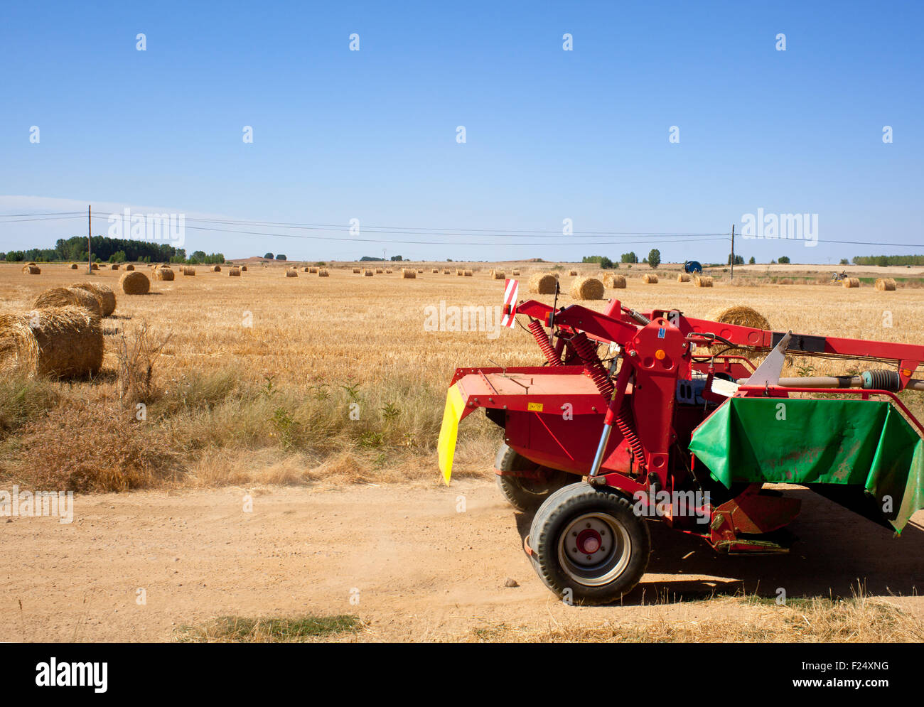 Tractor in a field, Spanish countryside Stock Photo Alamy