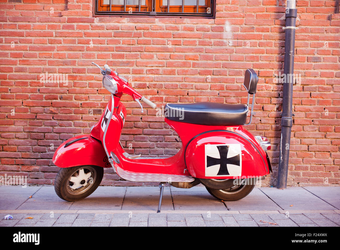 Vespa, an Italian red scooter Stock Photo