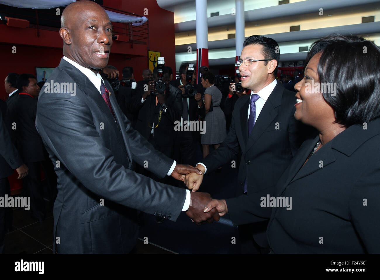 Port of Spain, Trinidad. 11th Sept, 2015. Keith Christopher Rowley (L), Prime Minister of Trinidad & Tobago, greets supporters after the swearing-in ceremony for Ministers of Government at Queen's Hall in Port of Spain, Trinidad on September 11, 2015. Credit:  SEAN DRAKES/Alamy Live News Stock Photo