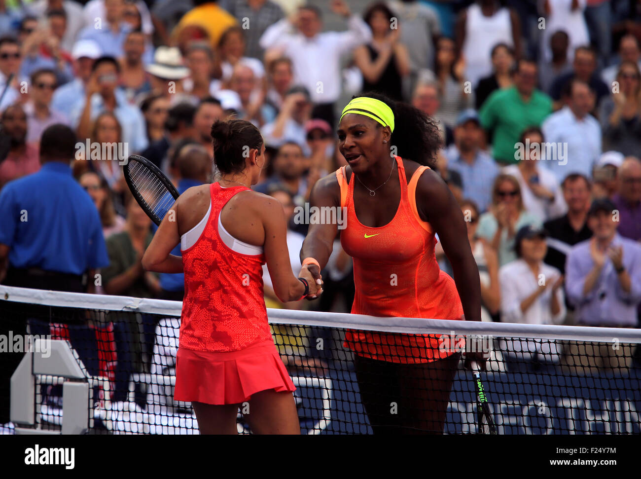 Flushing Meadows, New York, USA. 11th Sep, 2015. Roberta Vinci of Italy shakes hands with Serena Williams after defeating Williams in their semifinal match at the U.S. Open in Flushing Meadows, New York on the afternoon of September 11th, 2015.  Vinci won the match 2-6, 6-4, 6-4. Credit:  Adam Stoltman/Alamy Live News Stock Photo