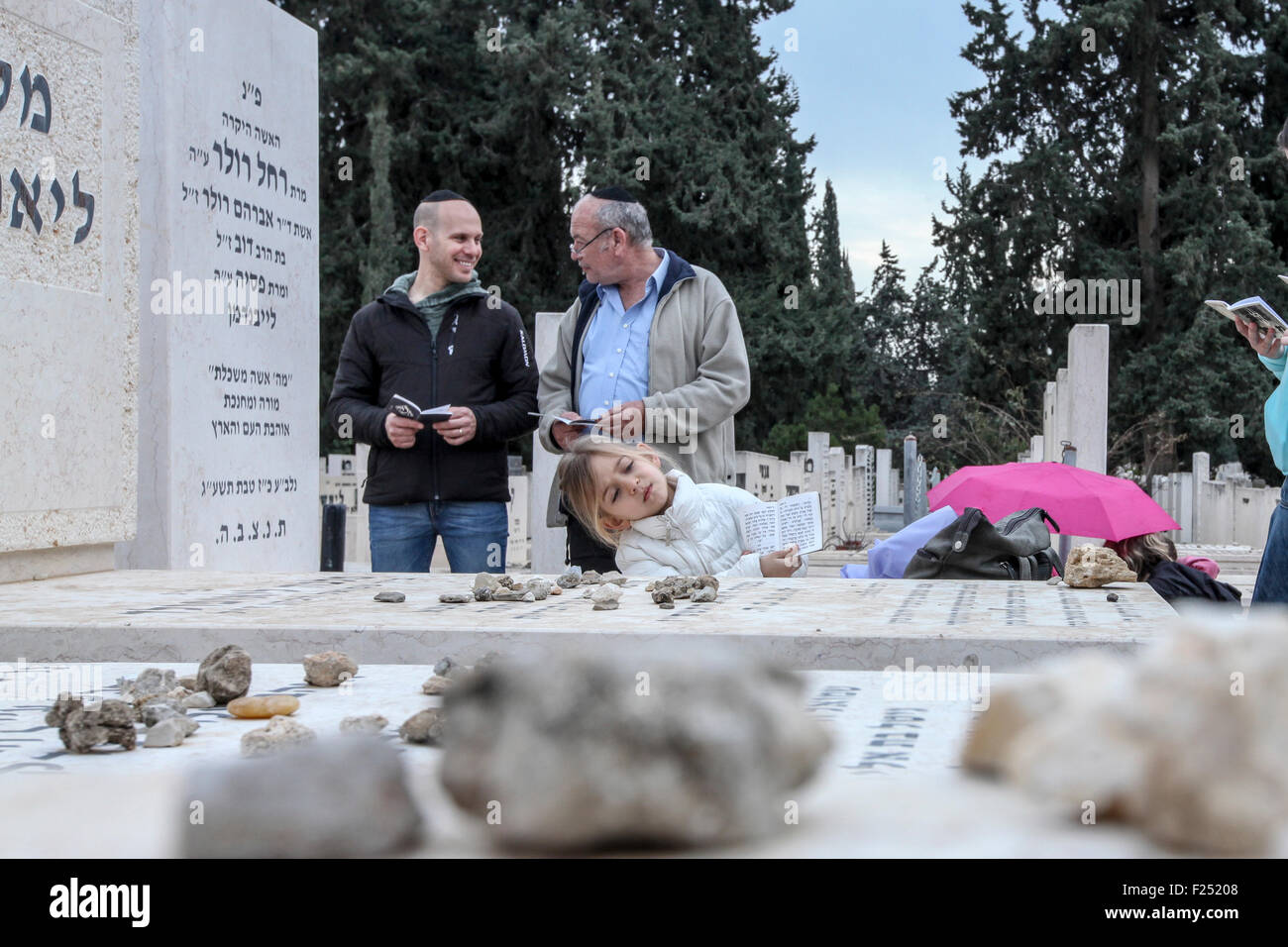 family members and friends of the deceased at the anual Azcara (bereavement) in Kiryat shaul cemetery in Tel Aviv Stock Photo