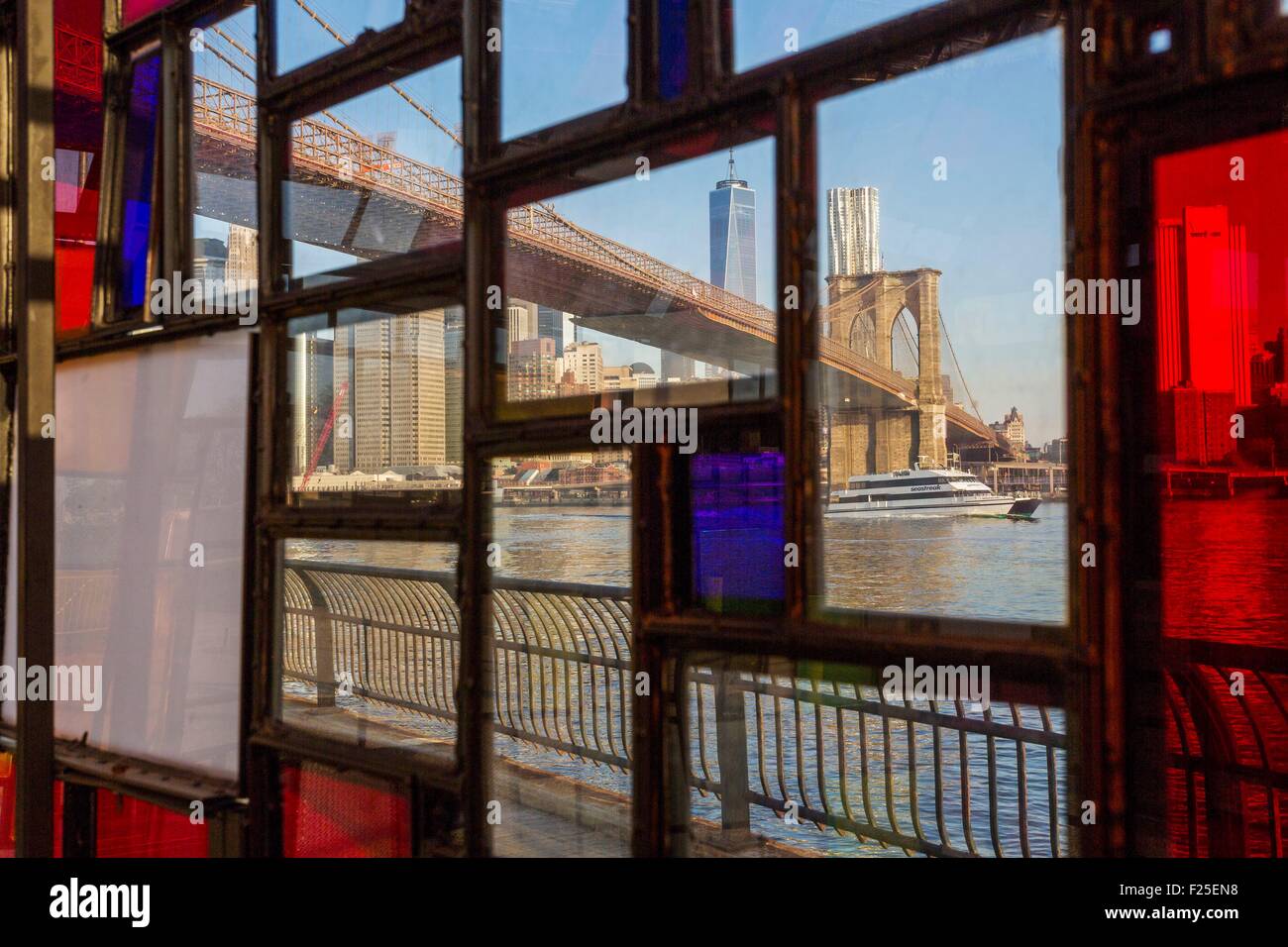 United States, New York, Brooklyn Dumbo neighborhood (District Under the Manhattan Bridge Overpass), view of the East River, Manhattan and the Brooklyn Bridge through the windows of a work of art Stock Photo
