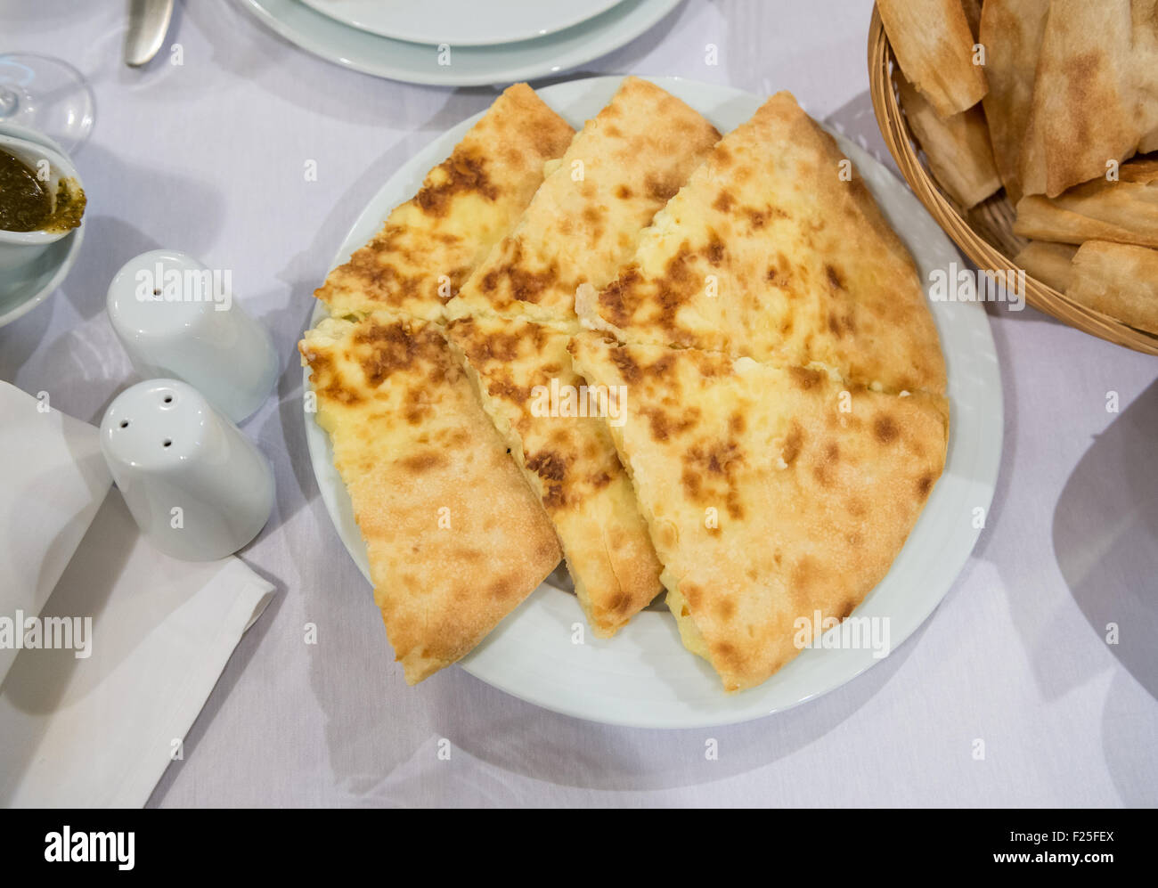 traditional Georgian cheese filled bread called Imeretian khachapuri Stock Photo