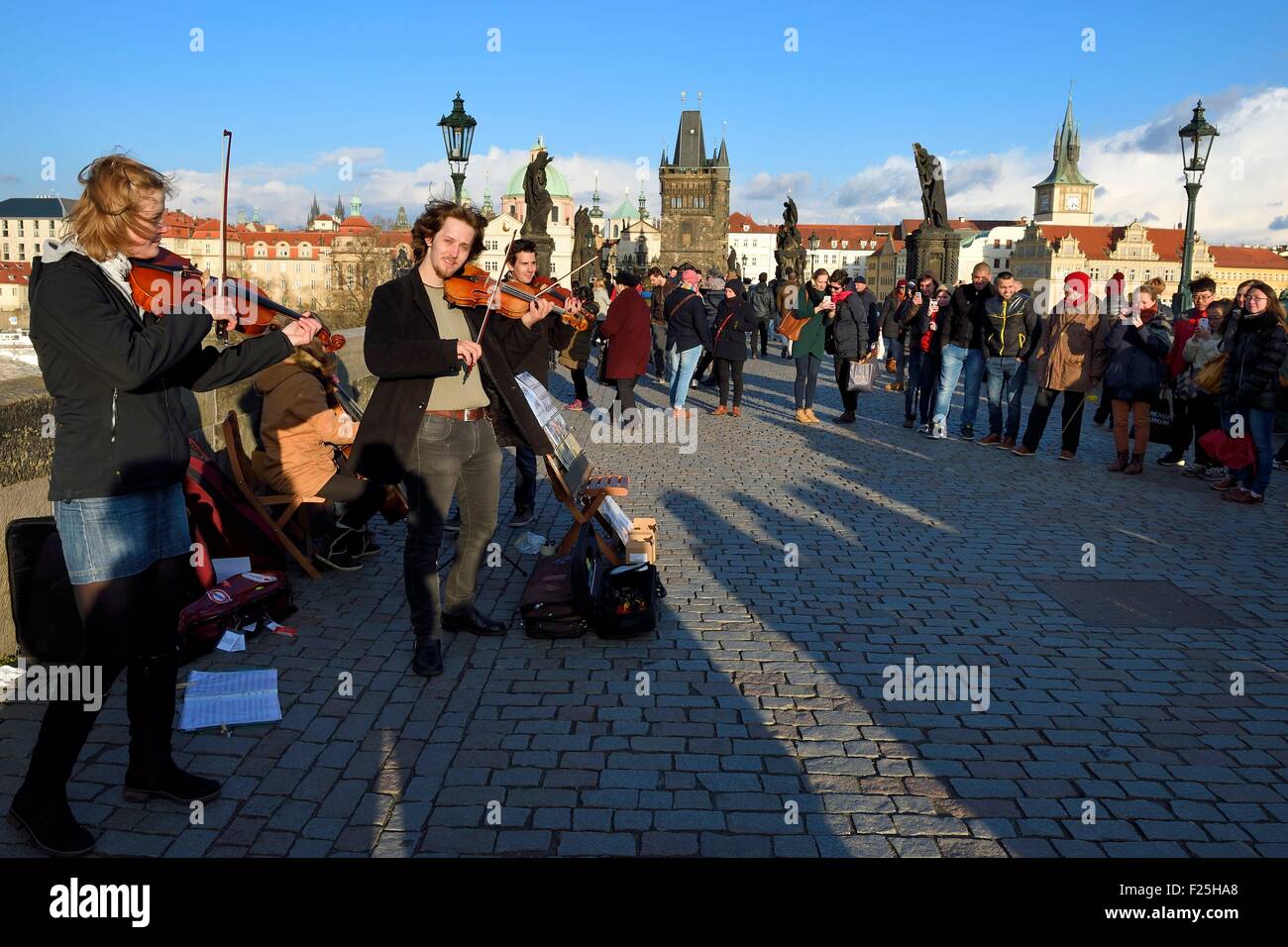 Czech Republic, Prague, historical centre listed as World Heritage by UNESCO, violinists concert on the Charles Bridge over Vltava River Stock Photo