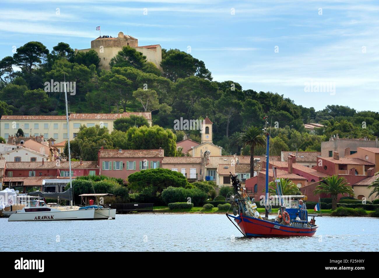 France, Var, Iles d'Hyeres, Parc National de Port Cros (National park of Port  Cros), Porquerolles island, Bernard Samuel called Sam the fisherman on his  boat called Le Corailleur leaving the Porquerolles port