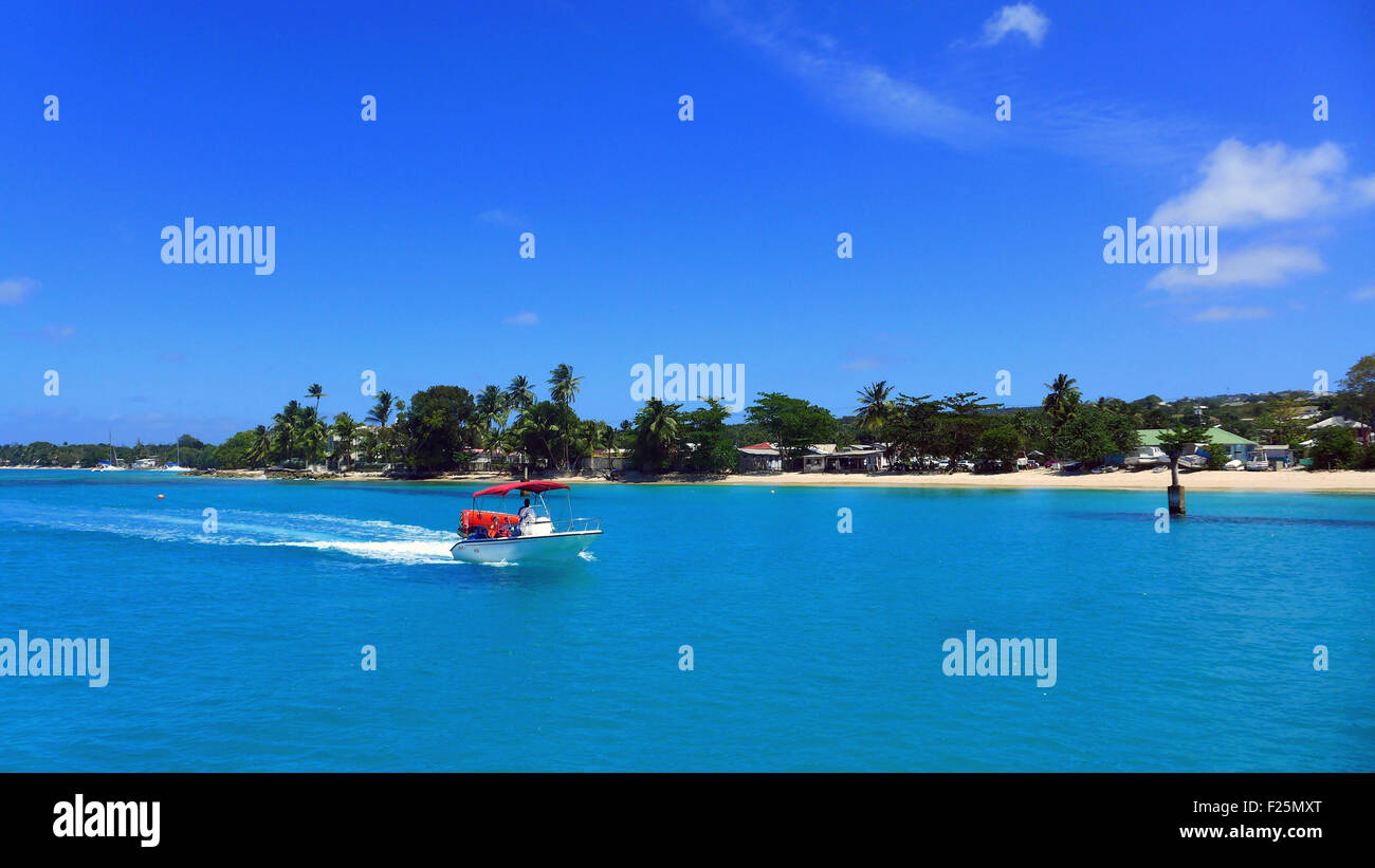 Barbados coastline from the sea with boat Stock Photo