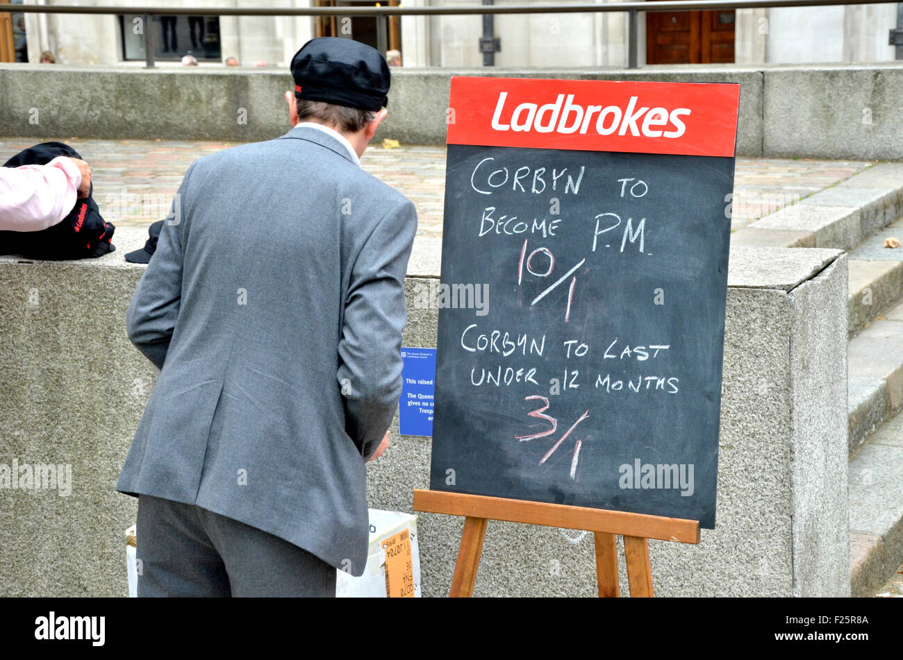 London, UK. 12th Sep, 2015. Crowds gather outside the Queen Elizabeth II Conference Centre in Westminster for the result of the Labour Party leadership Election. Ladbrooks bookmakers offering odds Credit:  PjrNews/Alamy Live News Stock Photo