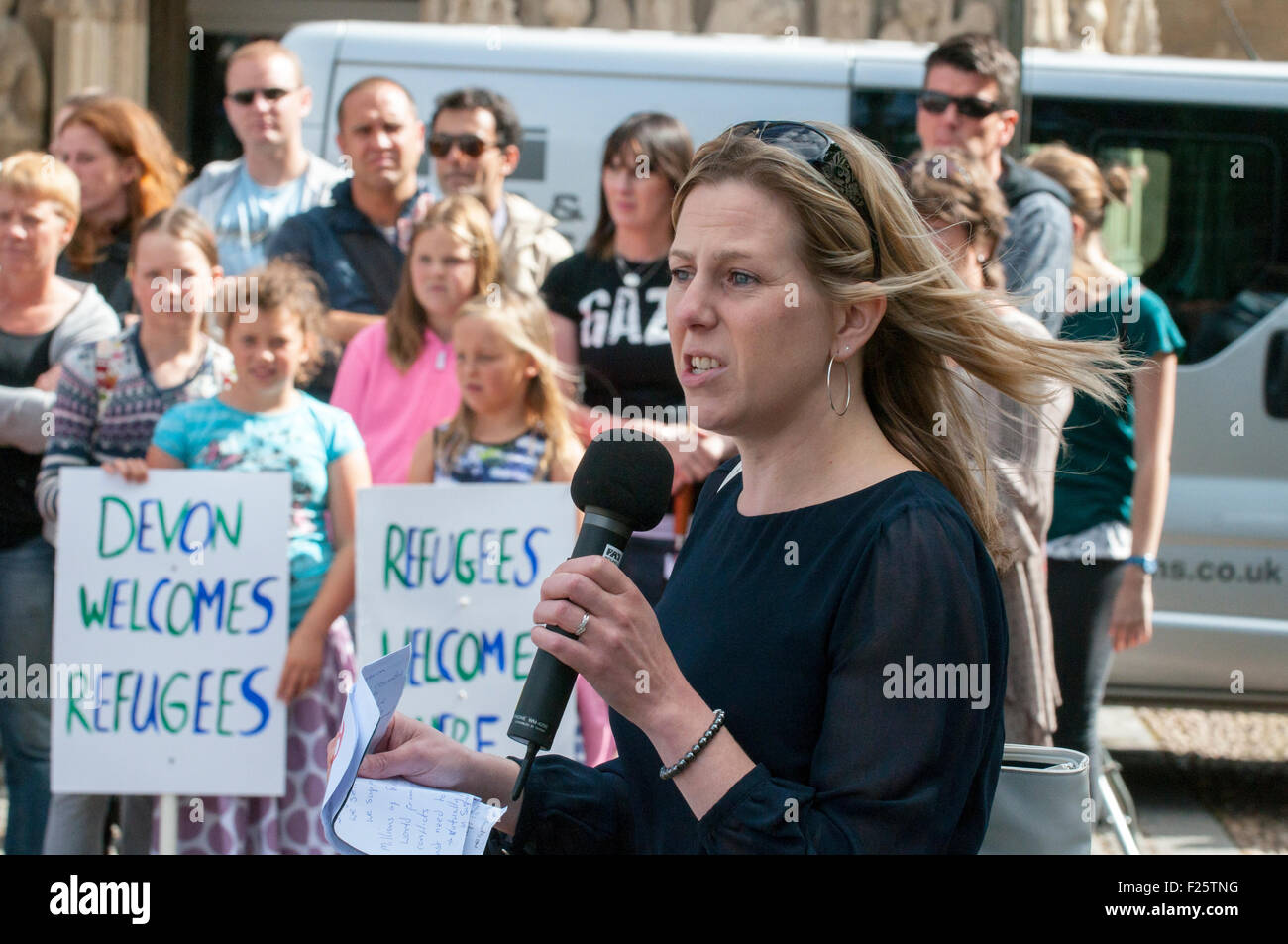 Exeter, Devon, UK. 12th Sep, 2015. Exeter Labour Party Councillor for St. Thomas, Hannah Packham, speaking during the Exeter Solidarity With Refugees Event outside the west front of Exeter Cathedral Credit:  Clive Chilvers/Alamy Live News Stock Photo