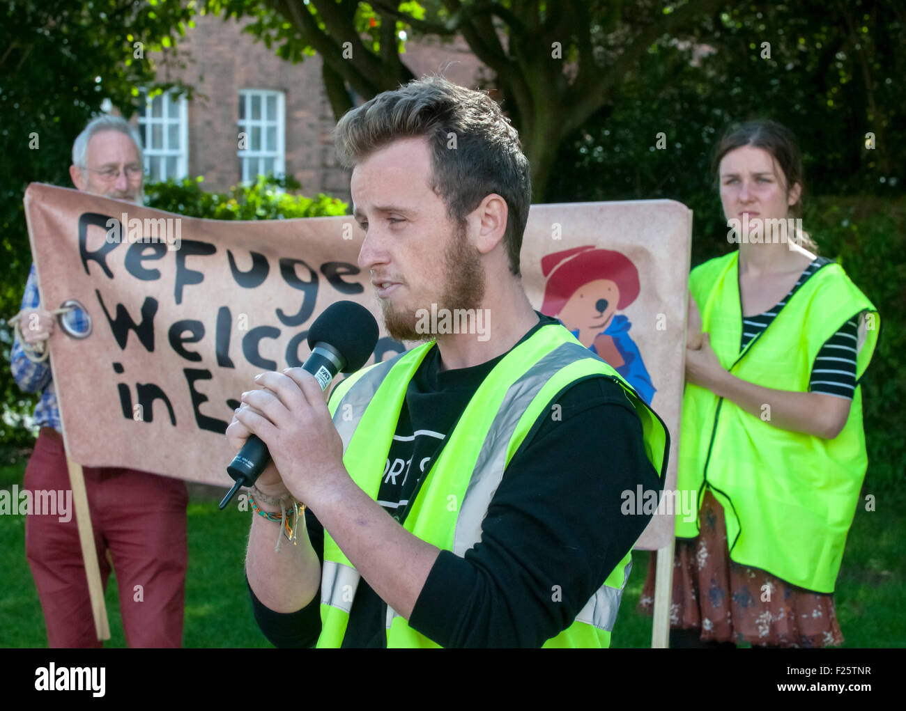 Exeter, Devon, UK. 12th Sep, 2015. Baraa Ehsssan Kouja speaking during the Exeter Solidarity With Refugees Event outside the west front of Exeter Cathedral Credit:  Clive Chilvers/Alamy Live News Stock Photo