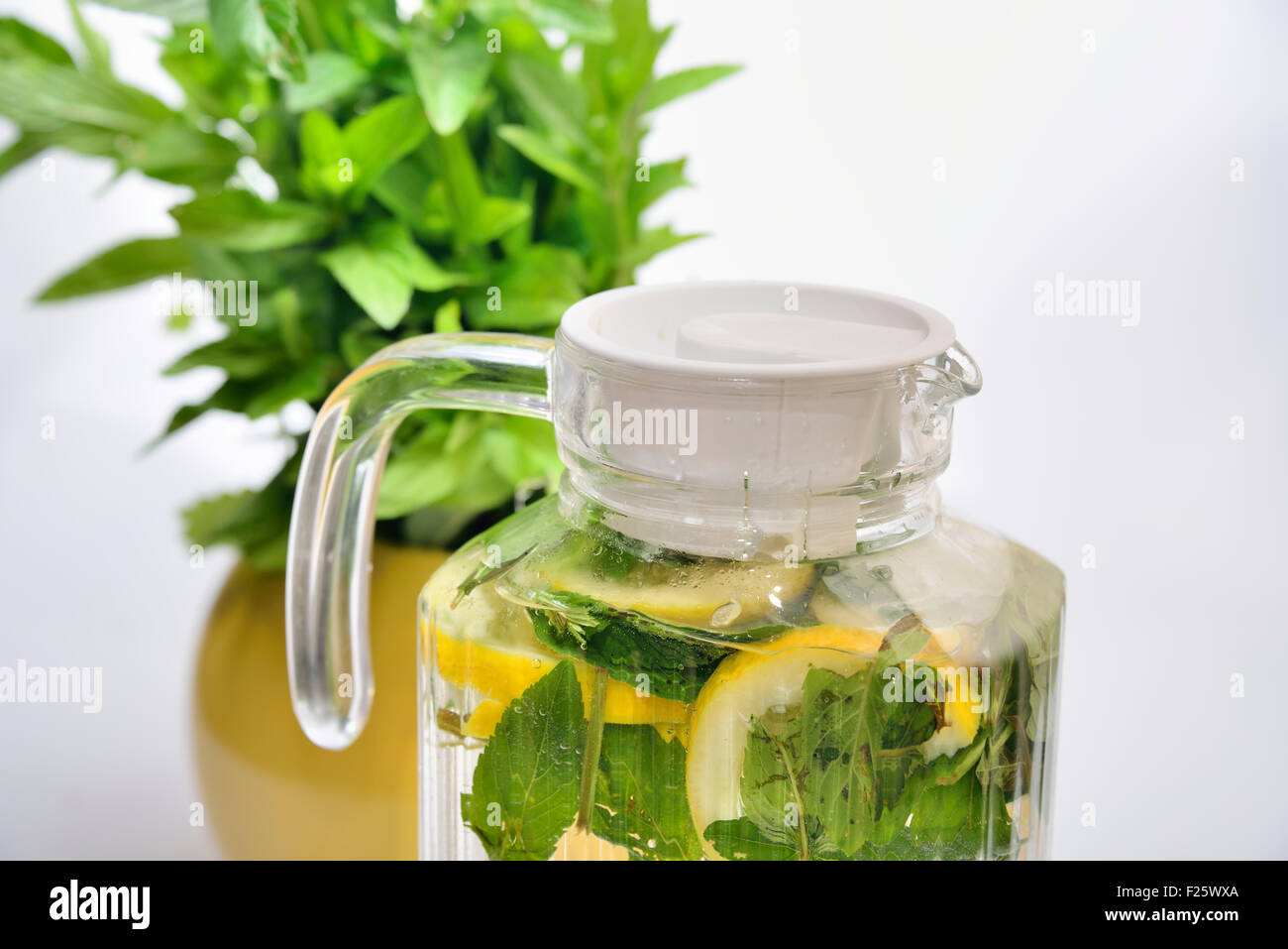 zoomed carafe with lemonade with mint Stock Photo