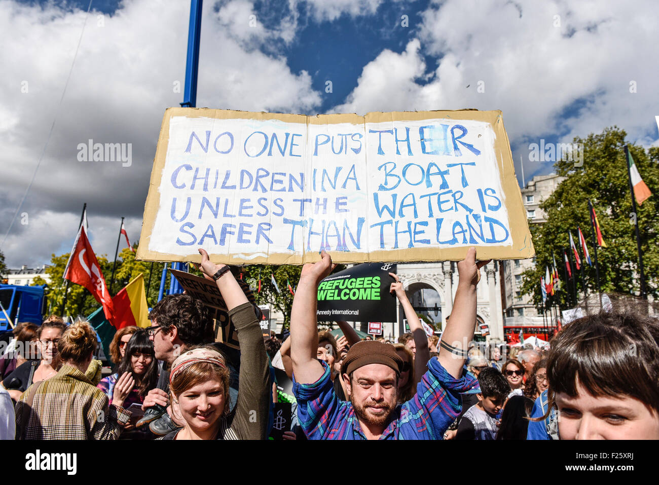 London, UK. 12th September 2015. As part of a national day of action many thousands of demonstrators march in support of refugees.  Credit: Gordon Scammell/Alamy Live News Stock Photo