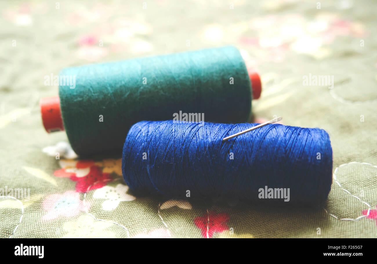 Blue thread with needle Stock Photo