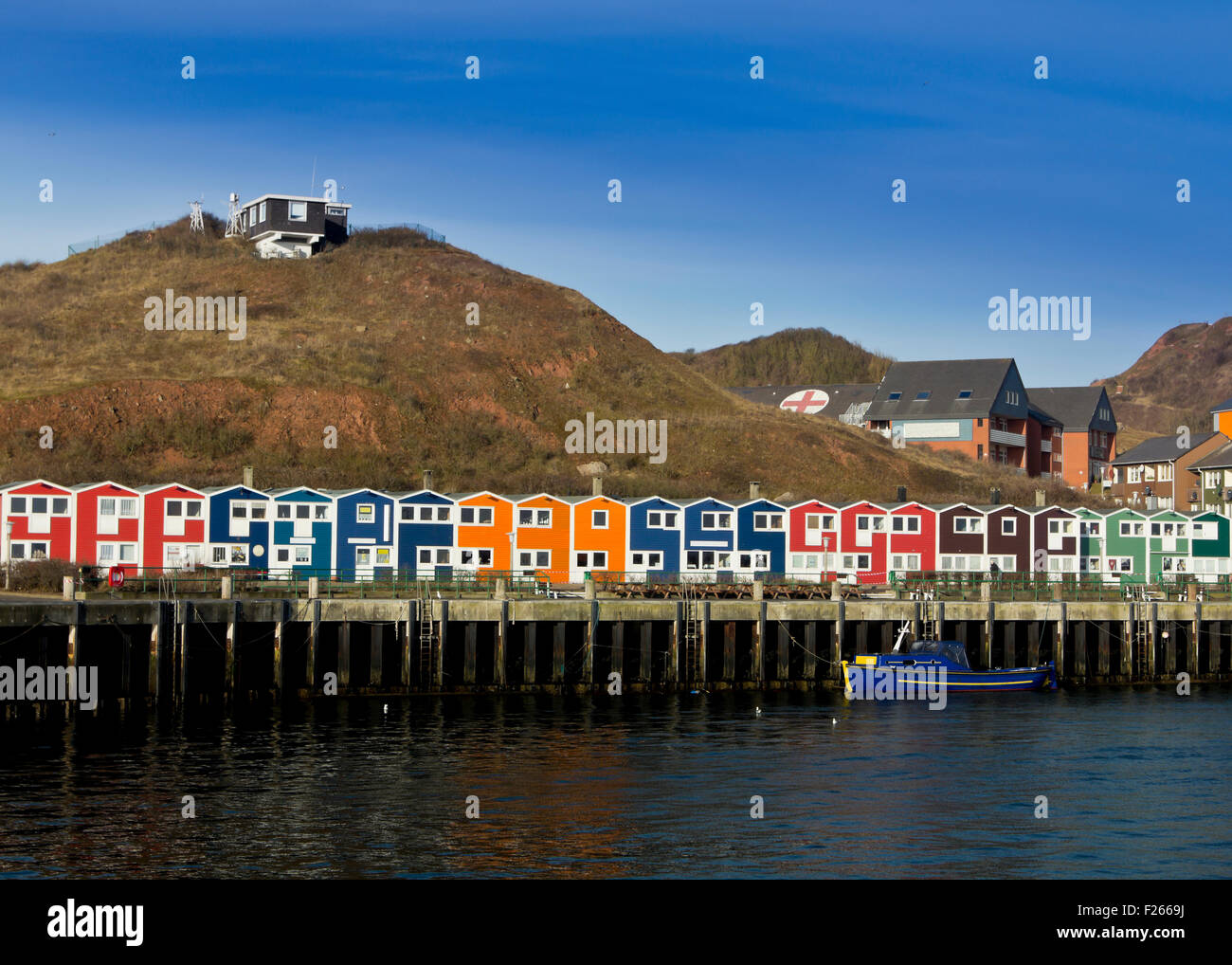 Traditional harbor houses at the fishermen's wharf of Helgoland Island in the North Sea (Germany) Stock Photo