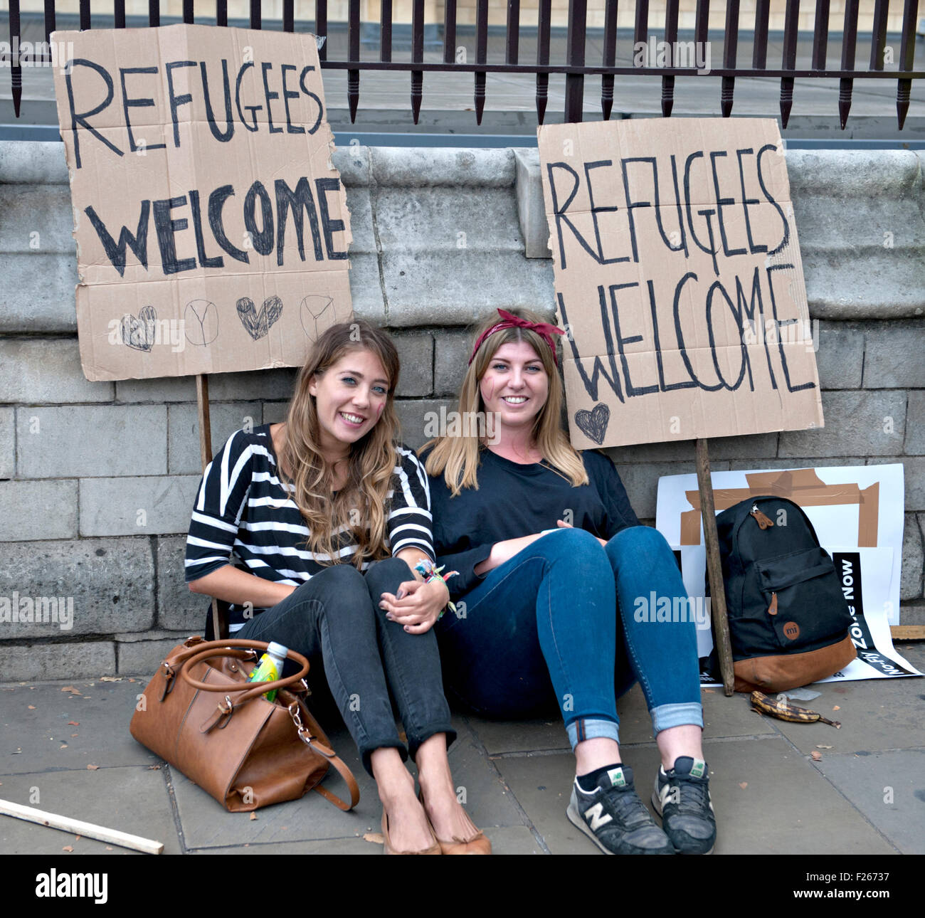 london-uk-12th-sep-2015-two-girls-rest-during-a-rally-to-show-solidarity-F26737.jpg