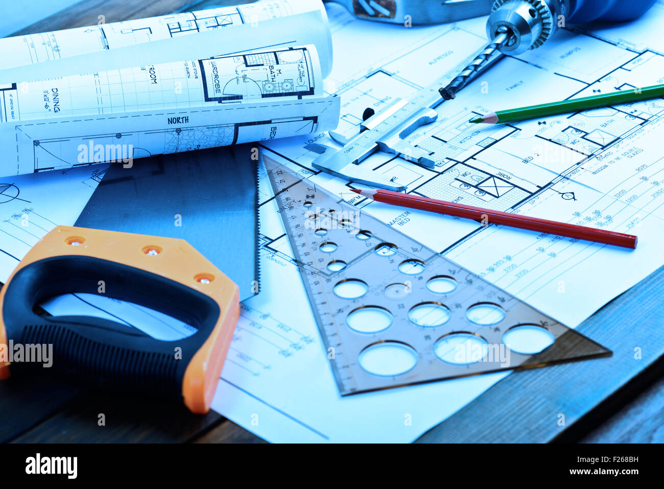 Architectural blueprints rolls and engineering items Stock Photo Alamy
