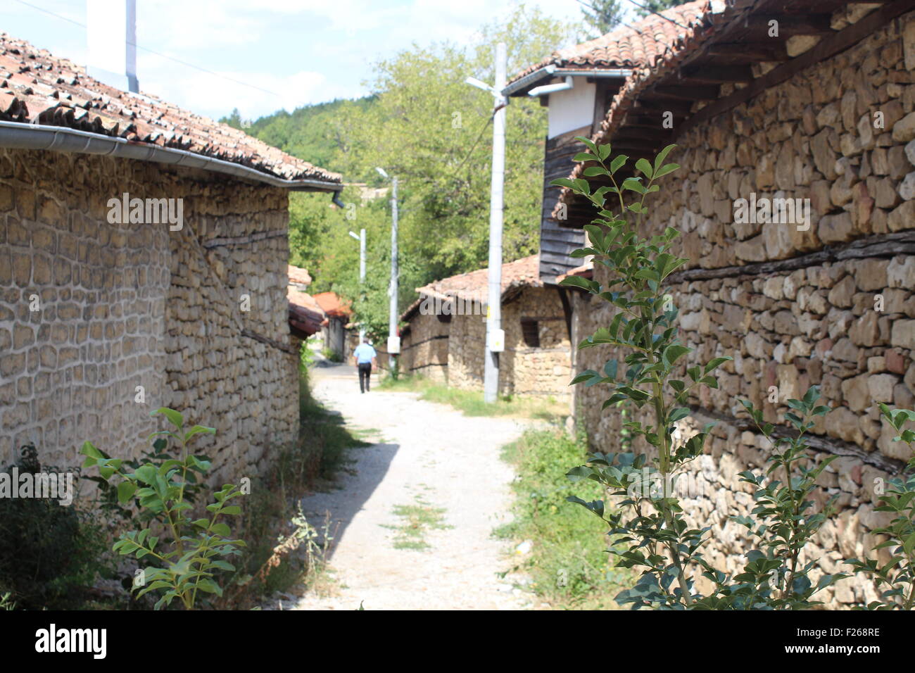 Typical narrow quaint street in the beautiful and authentic Arbanassi village in Bulgaria Stock Photo