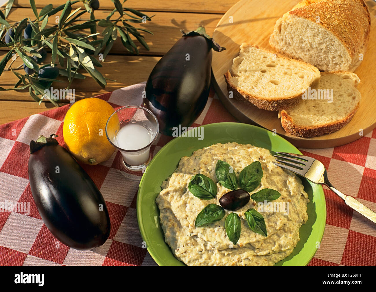 An eggplant dip served with bread, a typical Greek starter Stock Photo