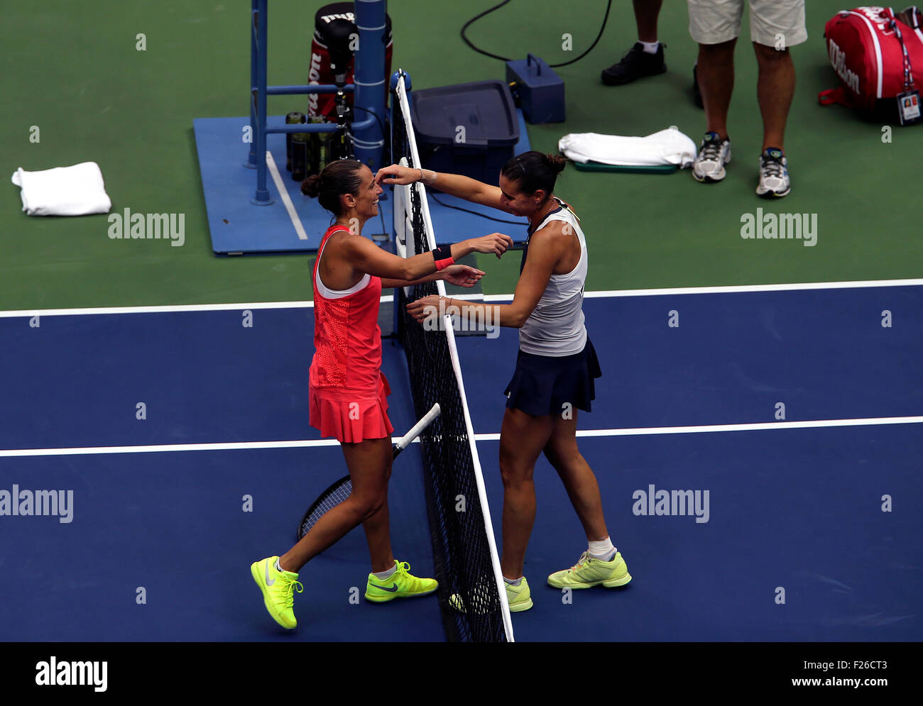New York, USA. 12th Sep, 2015. Flavia Penetta of Italy, right, receives a hug from countrywoman Roberta Vinci after defeating Vinci 7-6 (7-4), 6-2, in the finals of the U.S. Open at Flushing Meadows, New York on the afternoon of September 12th, 2015. Credit:  Adam Stoltman/Alamy Live News Stock Photo