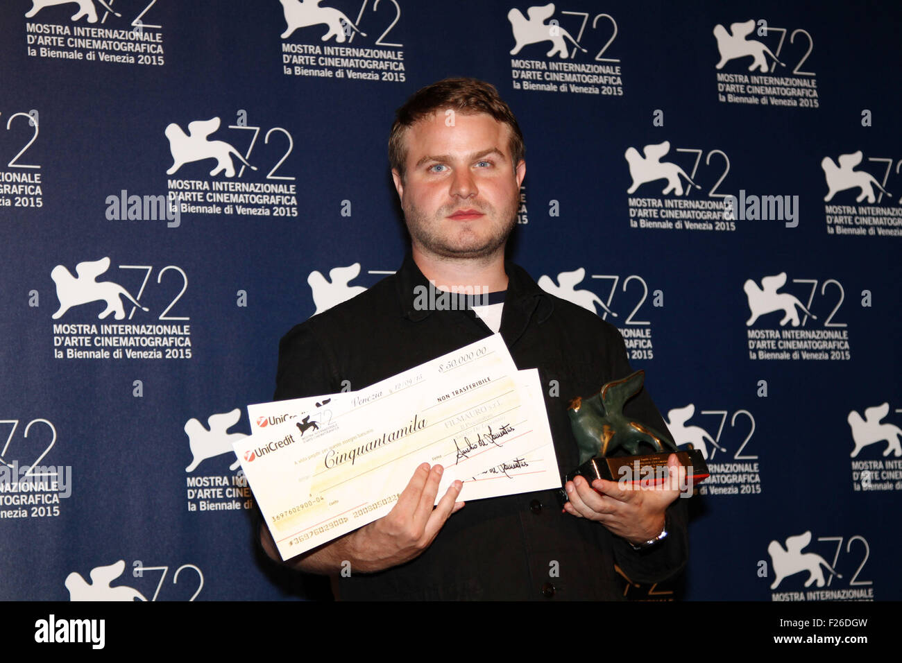Venice, Italy . 12th Sep, 2015. Brady Corbet poses with Lion of the future Luigi De Laurentiis Venice Award for debut film at the photocall for the winners of the of the 72nd Venice Film Festival on 12 September, 2015 in Venice Credit:  Andrea Spinelli/Alamy Live News Stock Photo
