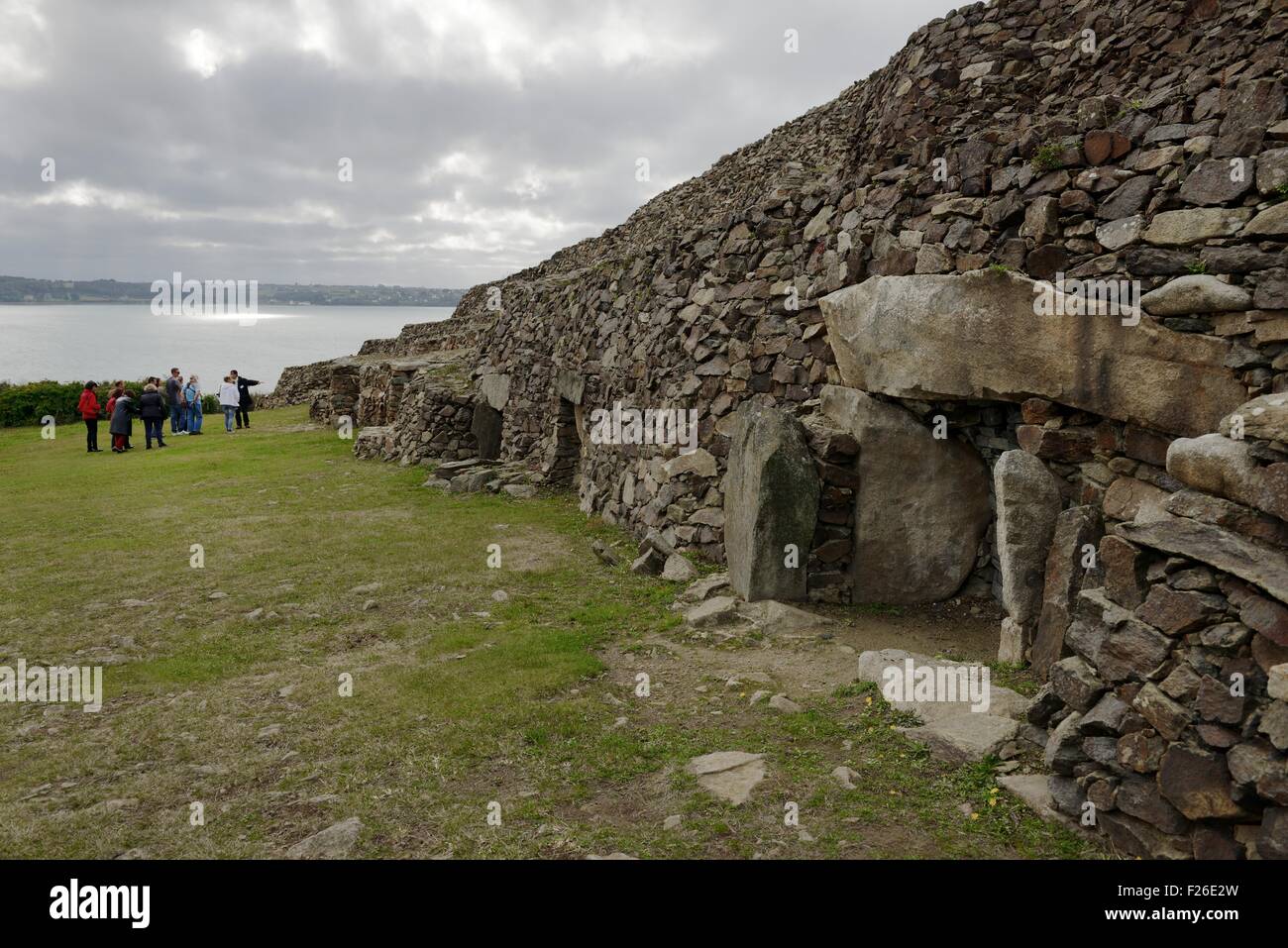 Early Neolithic 6800 year old Cairn Tumulus Mound of Barnenez contains 11 passage grave chambers. Plouezoc’h, Finistere, France Stock Photo