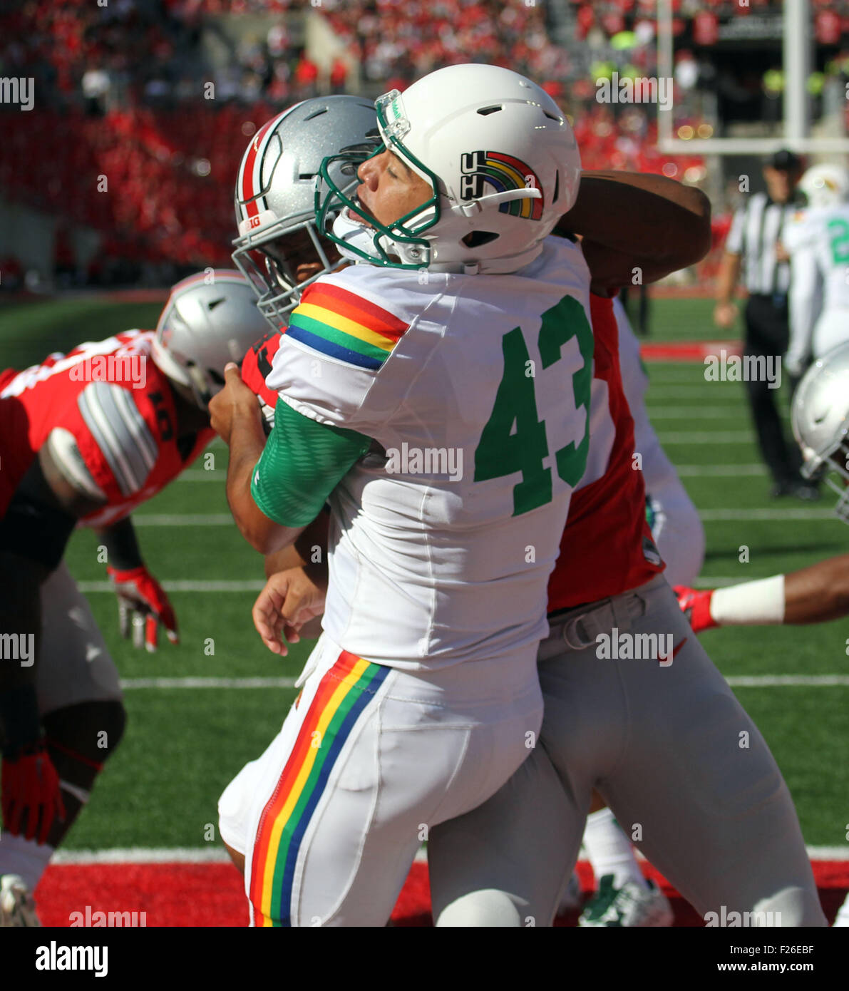 September 12, 2015 - Hawaii Rainbow Warriors place kicker Rigoberto Sanchez #43 get roughed up and awarded a penalty during action between the Ohio State Buckeyes and the Hawaii Rainbow Warriors at Ohio Stadium in Columbus, OH. - Michael Sullivan/CSM Stock Photo