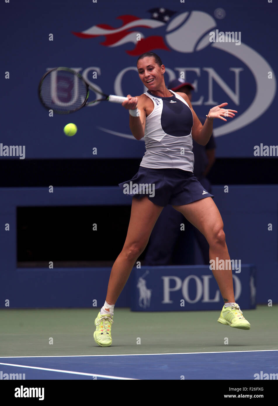 New York, USA. 12th Sep, 2015. Flavia Penetta of Italy returns a shot to countrywoman Roberta Vinci during the women's final of the U.S. Open at Flushing Meadows, New York on the afternoon of September 12th, 2015.  Pennetta won the match 7-6 (7-4), 6-2 Credit:  Adam Stoltman/Alamy Live News Stock Photo