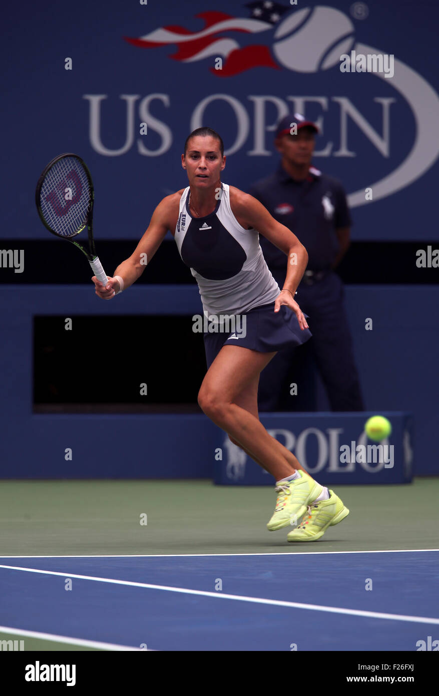 New York, USA. 12th Sep, 2015. Flavia Penetta of Italy returns a shot to countrywoman Roberta Vinci during the women's final of the U.S. Open at Flushing Meadows, New York on the afternoon of September 12th, 2015.  Pennetta won the match 7-6 (7-4), 6-2 Credit:  Adam Stoltman/Alamy Live News Stock Photo