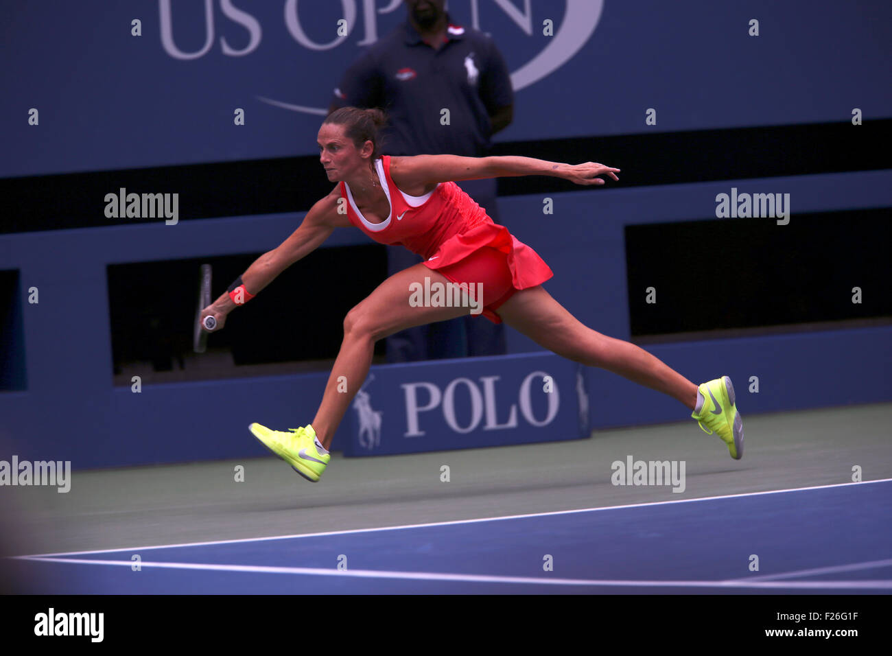 New York, USA. 12th Sep, 2015. Roberta Vinci of Italy reaches for a shot to countrywoman Flavia Penetta during the women's final of the U.S. Open at Flushing Meadows, New York on the afternoon of September 12th, 2015.  Pennetta won the match 7-6 (7-4), 6-2 Credit:  Adam Stoltman/Alamy Live News Stock Photo