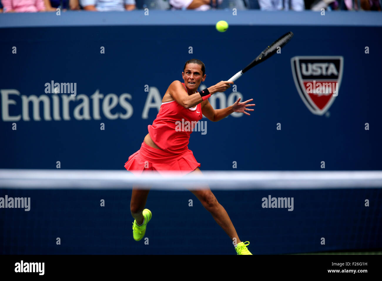 New York, USA. 12th Sep, 2015. Roberta Vinci of Italy returns a shot to countrywoman Flavia Penetta during the women's final of the U.S. Open at Flushing Meadows, New York on the afternoon of September 12th, 2015.  Pennetta won the match 7-6 (7-4), 6-2 Credit:  Adam Stoltman/Alamy Live News Stock Photo