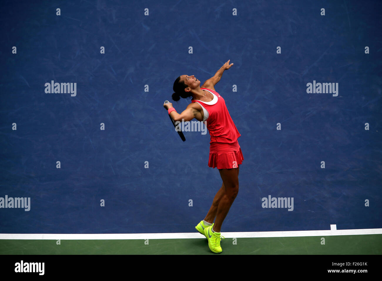New York, USA. 12th Sep, 2015. Roberta Vinci of Italy serves to countrywoman Flavia Penetta during the women's final of the U.S. Open at Flushing Meadows, New York on the afternoon of September 12th, 2015.  Pennetta won the match 7-6 (7-4), 6-2 Credit:  Adam Stoltman/Alamy Live News Stock Photo
