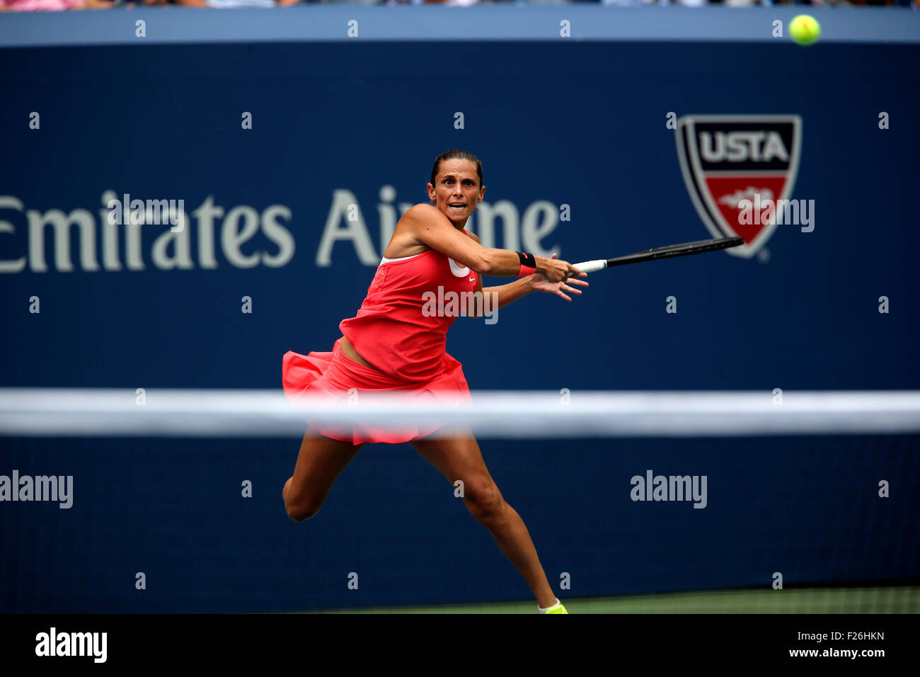 New York, USA. 12th Sep, 2015. Roberta Vinci of Italy returns a shot to countrywoman Flavia Penetta during the women's final of the U.S. Open at Flushing Meadows, New York on the afternoon of September 12th, 2015.  Pennetta won the match 7-6 (7-4), 6-2 Credit:  Adam Stoltman/Alamy Live News Stock Photo