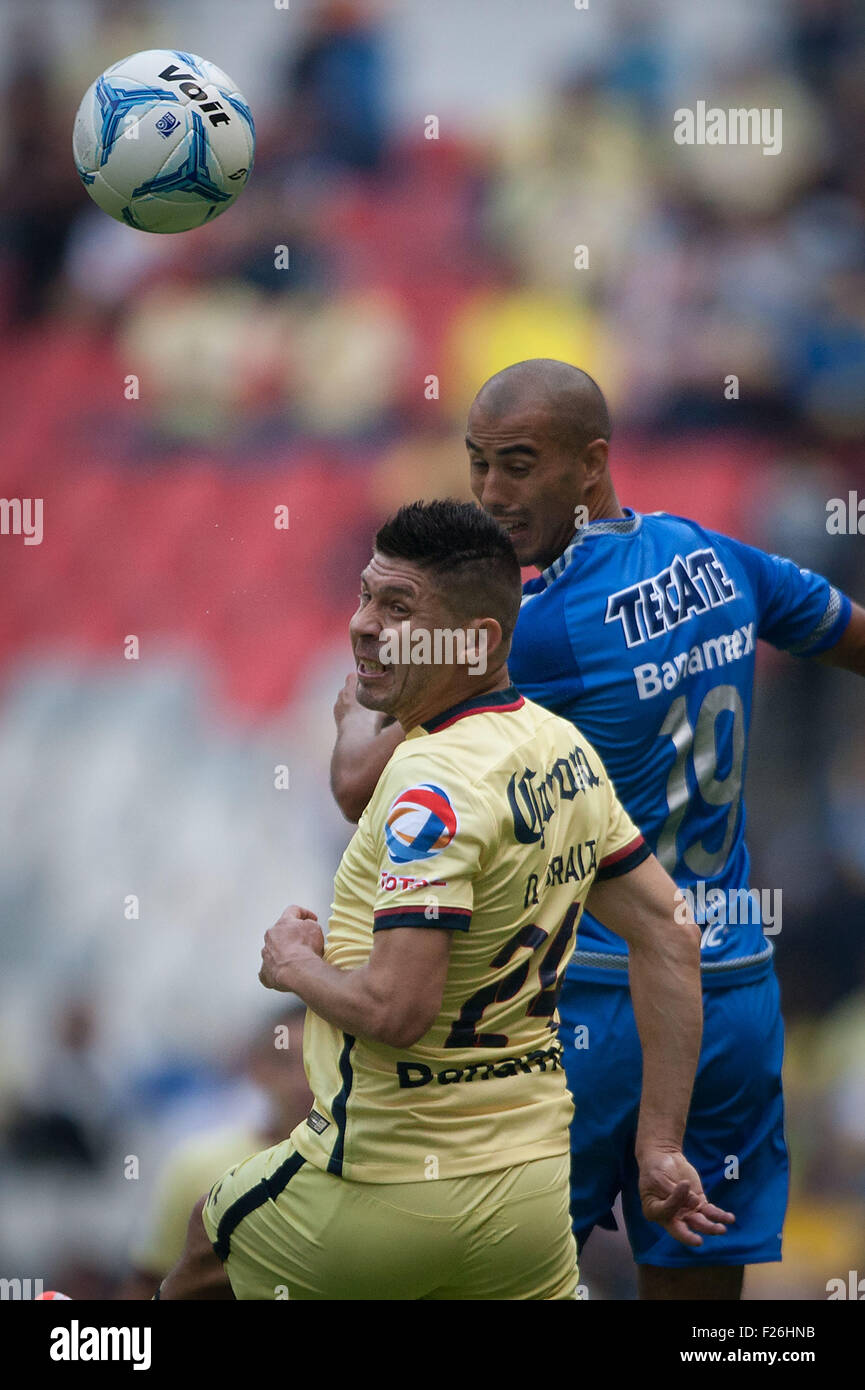 Mexico City, Mexico. 12th Sep, 2015. America's Oribe Peralta (L) vies with Tigres' Guido Pizarro during the match corresponding to Day 8 of Opening Tournament of MX League, at Azteca Stadium, in Mexico City, capital of Mexico, on Sept. 12, 2015. © Pedro Mera/Xinhua/Alamy Live News Stock Photo