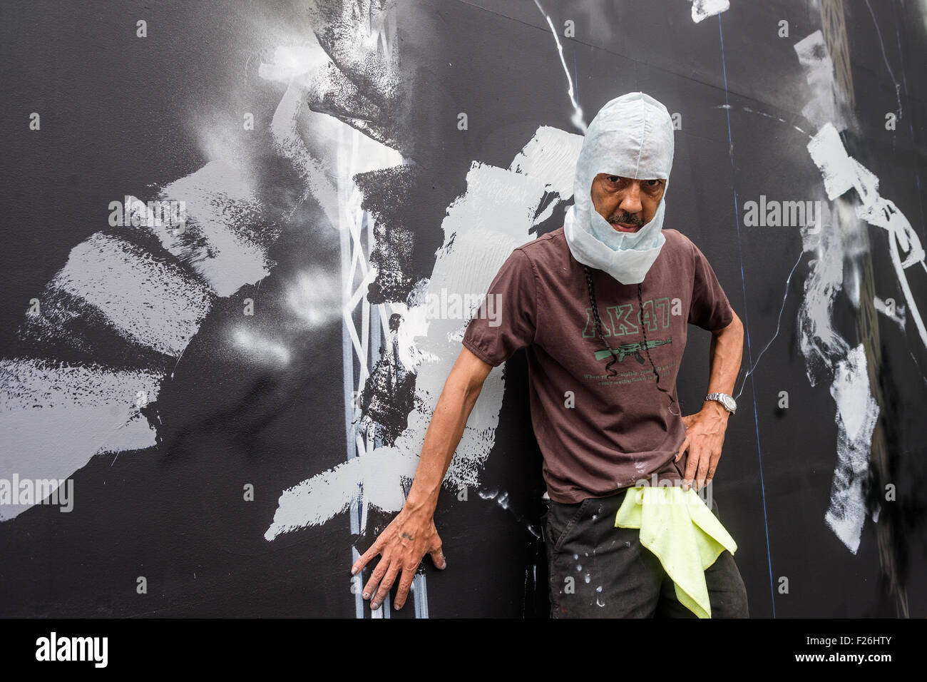 New York, NY 12 September 2015 -  Futura (aka Lenny McGurr, Futura 2000) photo op by his work-in-progress at the Bowery Mural ©Stacy Walsh Rosenstock/Alamy Stock Photo