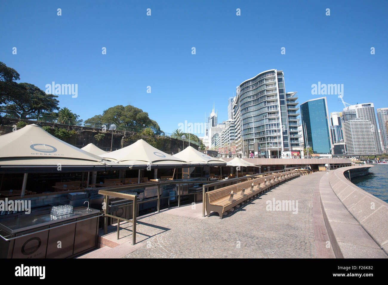 View of opera bar at Circular Quay and high rise office and apartment buildings Circular Quay