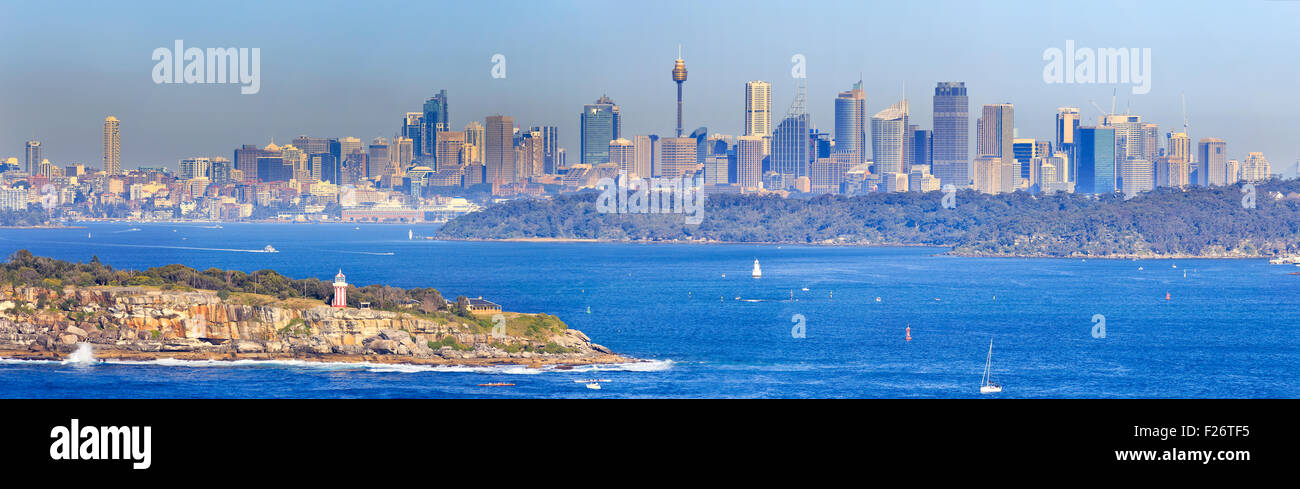 panoramic view on Sydney city CBD from North HEad lookout at the entrance to Sydney Harbour on a sunny bright day Stock Photo