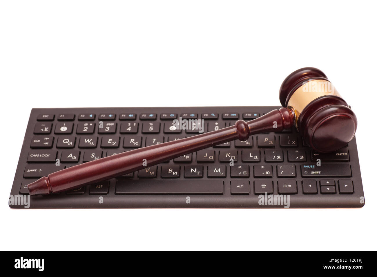 Gavel on black computer keyboard Stock Photo - Alamy